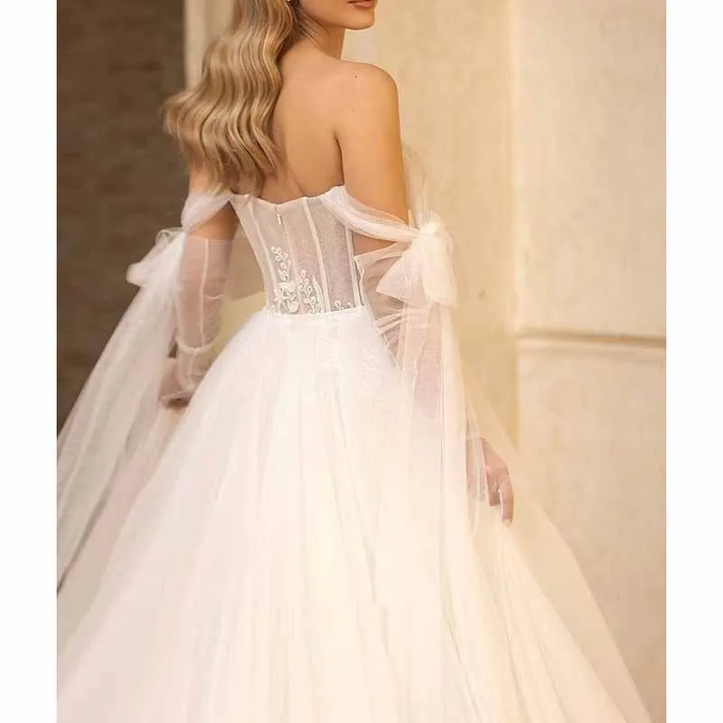 A-Line Princess Off-the-Shoulder Sweep Train Tulle Wedding Dresses